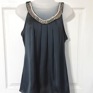 Peridot sleeveless blouse with jeweled neckline size small.